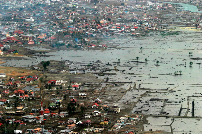 Indonesia has just been hit by another serious earthquake, but no repeat of the quake and tsunami of 2004. An aerial view of the devastated coastal area in Banda Aceh, Indonesia February 2005. Photo: Mast Irham/EPA