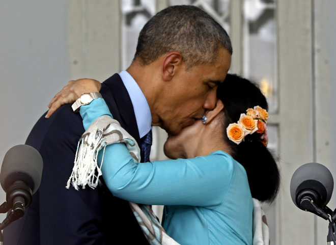 Washington Post questions US President Barack Obama's embrace of Myanmar. US President Obama (L) hugs Myanmar opposition leader Daw Aung San Suu Kyi during the joint press conference at Suu Kyi's residence in Yangon, Myanmar, November 14, 2014. Photo: Nyein Chan Naing/EPA