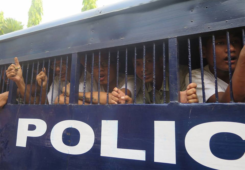 A total of 69 of students and supporters are taken back to prison after a hearing at Letpadan Township Court on March 25, 2015. Photo: Min Min/Mizzima