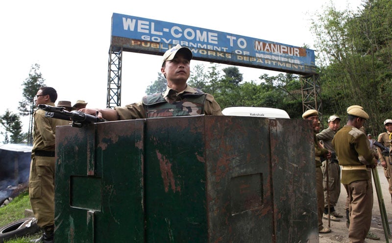 Indian security personal on guard duty at the Mao gate at the Nagaland-Manipur state border about 30 kms from Kohima, capital of Nagaland state, northeast India, May 7, 2010. Photo: EPA