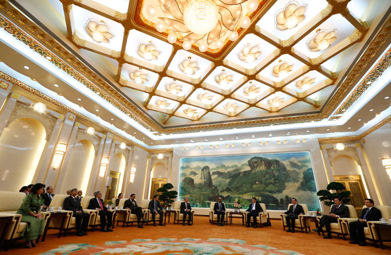 Chinese President Xi Jinping's (C-R) meeting with the members of the Asian Infrastructure Investment Bank or AIIB in the Great Hall of the People in Beijing, China October 24, 2014. Photo: Takaki Yajuma/EPA