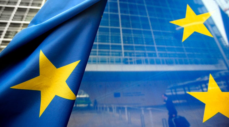 The European Union flag flies outside the European Commission Building, the Berlaymond, in Brussels. Photo: Olivier Hoslet/EPA