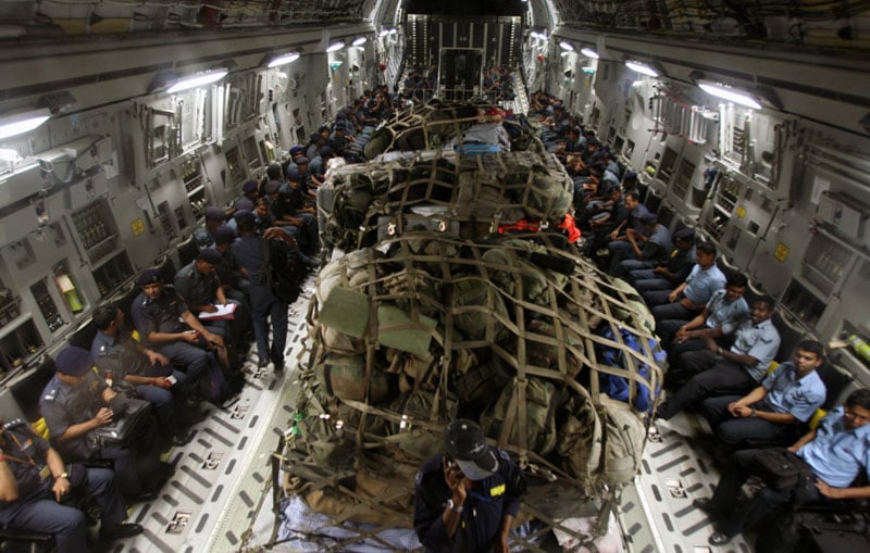 Indian aid - National Disaster Relief Force and IAF teams with relief material on their way to earthquake hit Nepal, April 27, 2015. Photo: EPA