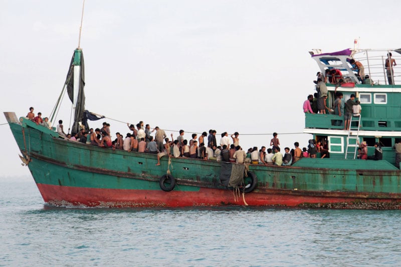 Refugees from Myanmar and Bangladesh are seen in their boat before their rescue by Aceh fisherman in Julok, East Aceh, Sumatra, Indonesia, 20 May 2015. Photo: EPA