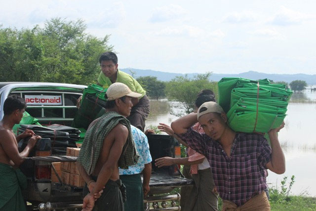 Distribution of tarpaulins at Kyun Kalay Village, Pakokku Township on 7 August 2015. Photo: ActionAid