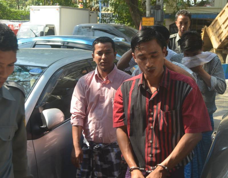 Five people arrested for their involvement in printing a calendar attend a hearing at Pazundaung Township Court on 1 December, 2015. Photo: Myanmar Now