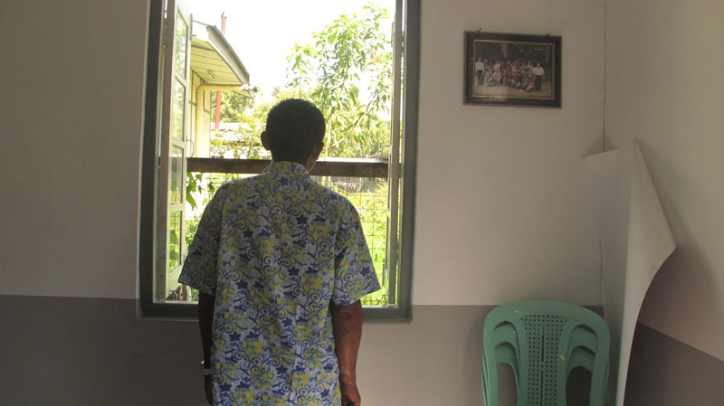 An HIV patient stares out of a window at an HIV hospice in Yangon’s South Dagon township. (Photo: Ei Cherry Aung/Myanmar Now)