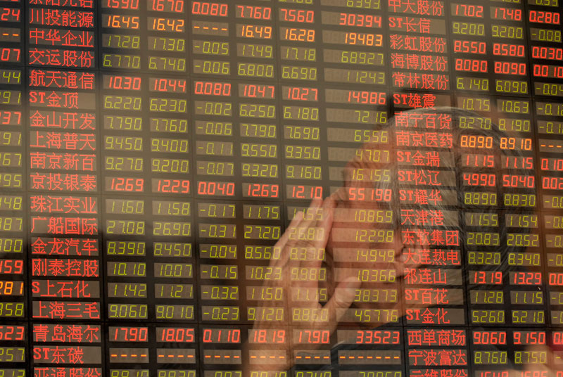 Shanghai shares rise. Photo: Wenhao Yu/EPA