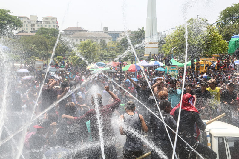 Trying to cool down in Myanmar during the water festival - Photo: Hong Sar/Mizzima