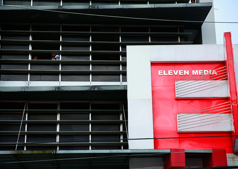The facade of Eleven Media Group head office building in Yangon. Photo: Lynn Bo Bo/EPA