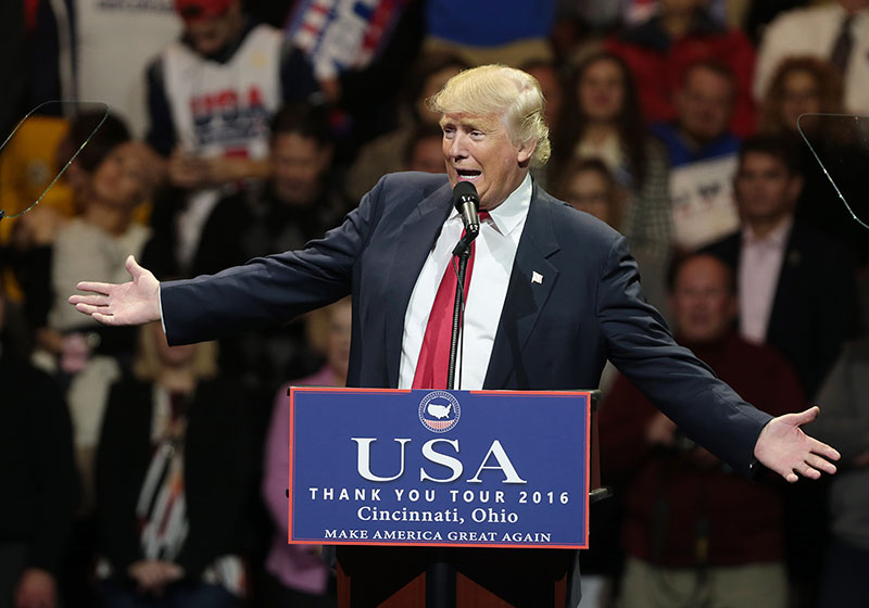 US President-elect Donald Trump reacts during the first stop of his 'USA Thank You Tour 2016' rally at US Bank Arena in Cincinnati, Ohio, USA, 1 December 2016. Photo: Mark Lyons/EPA
