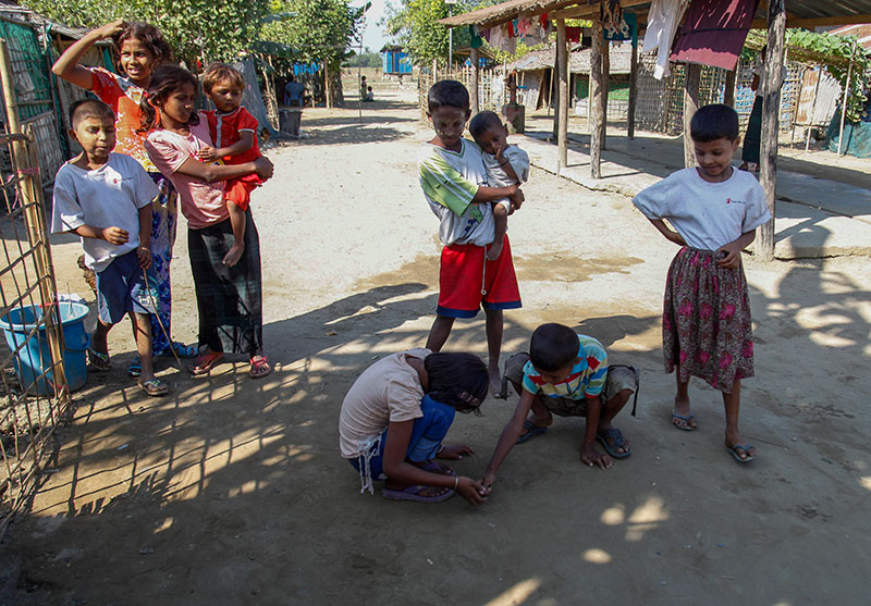 Muslim children play at Thetkel Pyin Muslim Internally Displaced Persons (IDPs) camp, near Sittwe of Rakhine State, 19 December 2016. Photo: Nyunt Win/EPA
