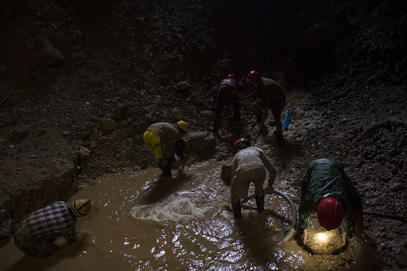 Miners working inside a ruby mine in Mogok, north of Mandalay. Myanmar produces more than 80 percent of the world's rubies, yet decades of isolation under the former military junta means the industry remains cloaked in mystery. Photo: Ye Aung Thu/AFP