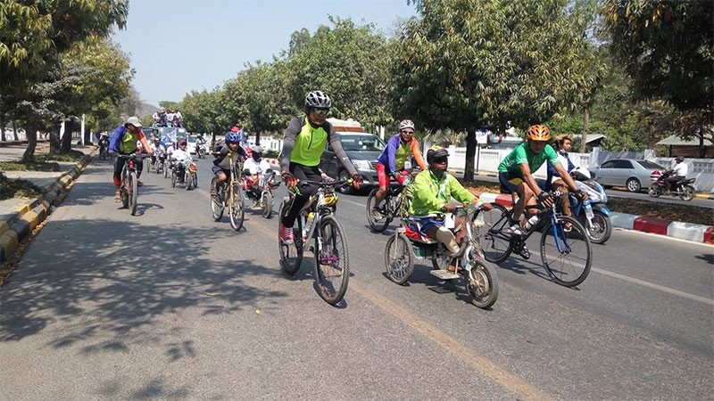Calling for peace - wheelchair riders on the road in Mandalay. Photo: Aung Ko Oo/Mizzima