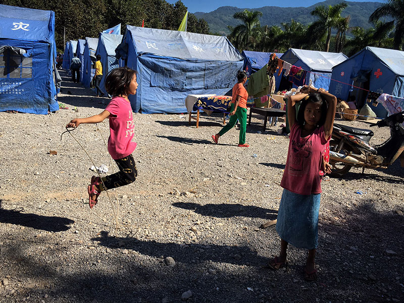 Myanmar girl skipping in a refugee camp near the border of China and Myanmar in Wanding town, Ruili city of Yunnan province in southwest China, 21 November 2016. Photo: EPA