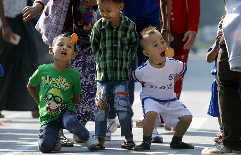VisionFund aims to help rural and urban communities. Photo: Hein Htet/EPA
