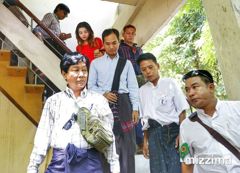 Myanmar Now Editor in Chief Swe Win (centre, behind) leaving the court hearing. Photo: Mizzima
