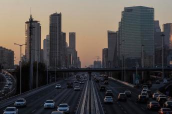 A view shows vehicles running in a main road in Beijing, China. Photo: EPA