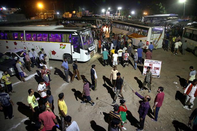 Amarnath shrine bound pilgrims board their vehicles as the first batch of Amarnath pilgrims leaves for Amarnath Yatra, an annual Hindu pilgrimage to the Amarnath shrine, in Jammu, the winter capital of Kashmir, India, 28 June 2017. Photo: Jaipal Singh/EPA