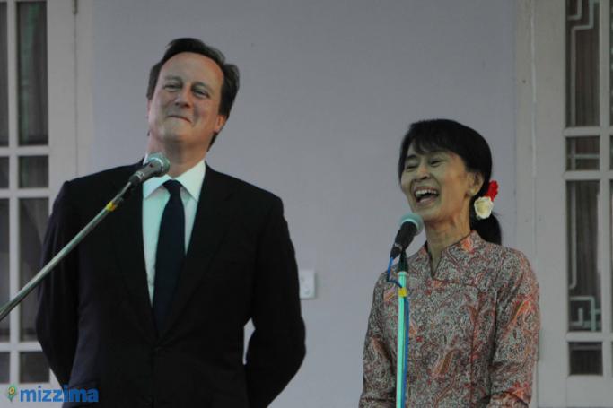 British Prime Minister David Cameron and Aung San Suu Kyi at a press conference at her home in Yangon in 2012. Photo: Mizzima