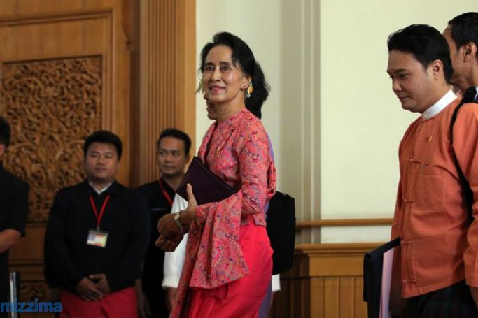 NLD Chairperson Daw Aung San Suu Kyi walks during a parliament session in Nay Pyi Taw on 1 February 2016. Photo: Thet Ko/Mizzima