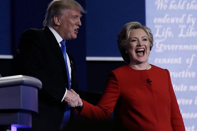 Democrat Hillary Clinton (R) and Republican Donald Trump (L) shake hands at the end of the first Presidential Debate at Hofstra University in Hempstead, New York, USA, 26 September 2016. Photo: Peter Foley/EPA