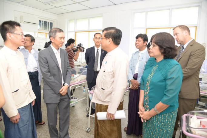 Left to Right (front line): Dr. Win Zaw Aung, Managing Director, Sea Lion Company Ltd.; Mr. Kovit Kantapasara, GE CEO of Thailand, Myanmar, and Laos; Professor Dr. Myint Han, Director General, Department of Medical Services, Ministry of Health; Dr. Daw Aye Aye Thein, Professor and Head (Neonate), Central Women’s Hospital