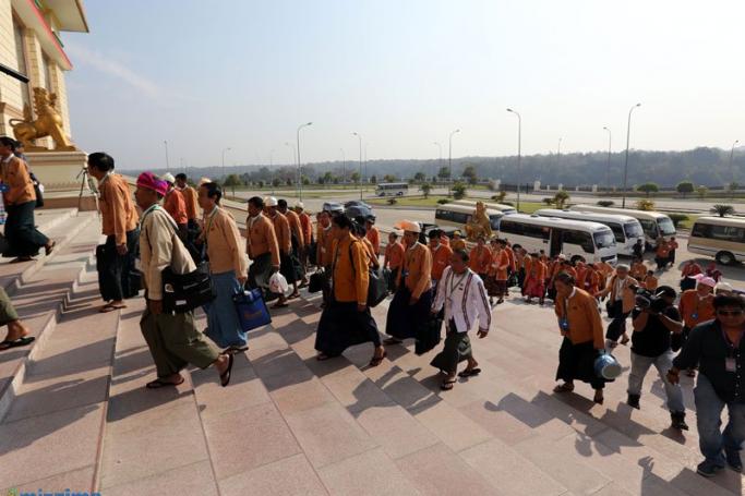 NLD MP's enter Parliament to attend for the first day of the second session of Pyidaungsu Hluttaw in Nay Pyi Taw on 8 February 2016. Photo: Thet Ko/Mizzima