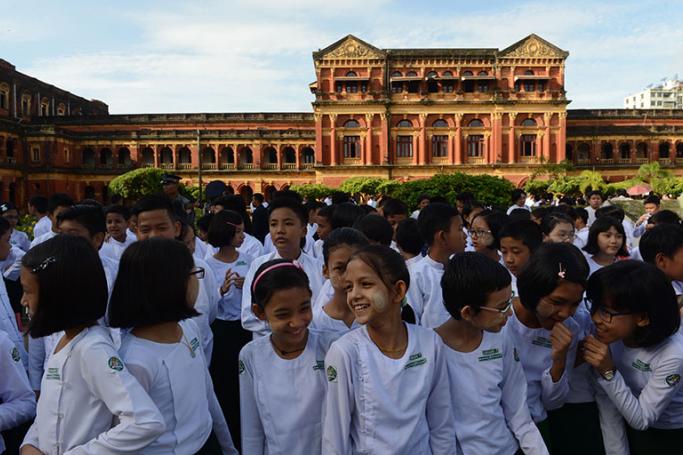 Students gather at the historic Secretariat building in Yangon. Photo: AFP