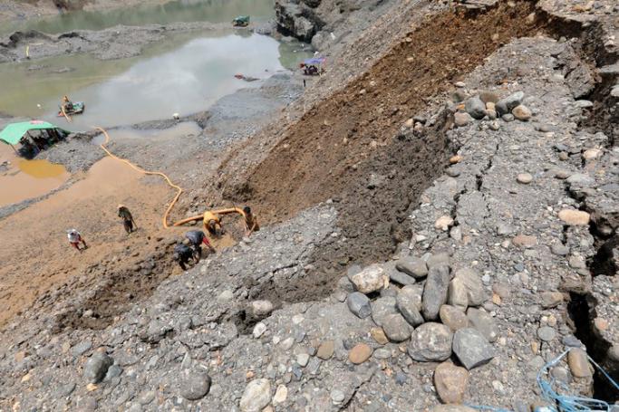 (File) Miners search for jade stones at the HpaKant jade mining area, Kachin State, northern Myanmar, 17 July 2019. Photo: EPA