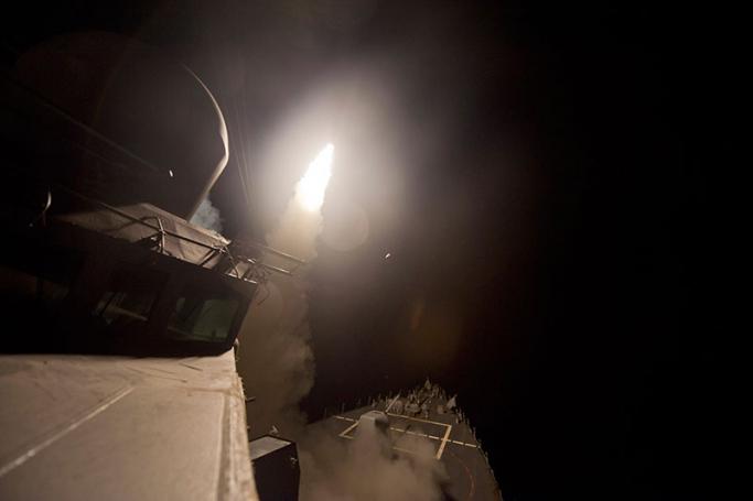 (FILE) - A handout picture released by the US Navy shows the guided-missile destroyer USS Arleigh Burke (DDG 51) launching Tomahawk cruise missiles against IS (Islamic State) targets in Syria, in the Red Sea, 23 September 2014 (reissued 07 April 2017). Photo: EPA