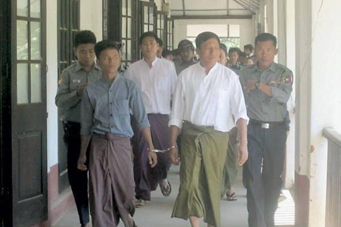 Unity journal employees on their way to Pakkoku Township Court in July. Photo: AAPP-B