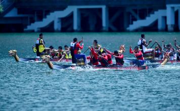 Team of Thailand (C) competes with team of Myanmar (L) in the men's 6-crew 200-meter traditional Dragon Boat race during the South East Asian Games (SEA Games) 2015 at Marina Bay in Singapore, 06 June 2015. EPA/LYNN BO BO