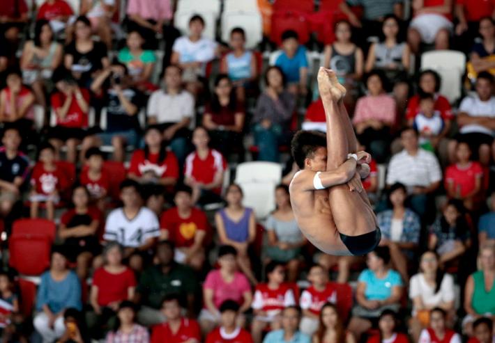 Zwe Thet Oo of Myanmar competes in the Men's 10m platform diving event at the 28th SEA Games in Singapore, 08 June 2015. EPA/WALLACE WOON