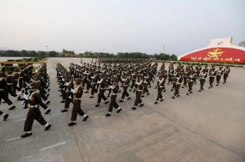Myanmar soldiers march during a parade commemorating the 77th Armed Forces Day in Naypyidaw Myanmar, 27 March 2022. Photo: AFP
