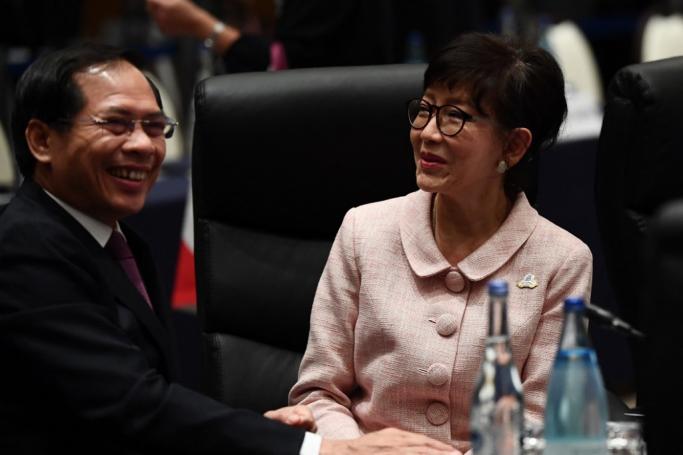 Vietnam's Deputy Foreign Minister Bui Thanh Son (L) and Thailand's advisor to the foreign affairs minister, Pornpimol Kanchanalak (R), attend the first plenary session of the G20 foreign ministers' meeting in Nagoya, Aichi prefecture on November 23, 2019. Photo: AFP