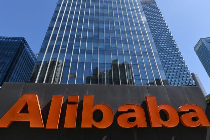 An Alibaba sign is seen outside the company's office in Beijing on April 13, 2021. GREG BAKER / AFP