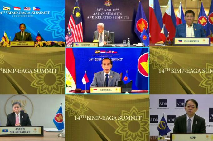 This handout photo released by the host broadcast, ASEAN Summit 2021, on October 28, 2021 shows Indonesia's President Joko Widodo (C) taking part in the East-ASEAN Growth Area Summit on the sidelines of the 2021 Association of Southeast Asian Nations (ASEAN) summit, held online on a live video conference in Brunei's capital Bandar Seri Begawan. Photo:  AFP