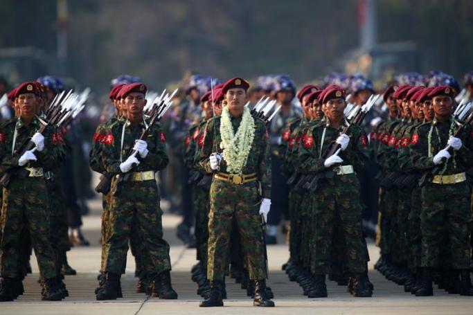 Myanmar military soldiers line up during the 70th Armed Forces Day in Naypyitaw, Myanmar, 27 March 2015. Photo: Lynn Bo Bo/EPA
