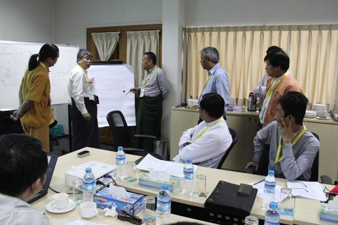 The nine-member political dialogue framework drafting team meeting at Myanmar Peace Centre in Yangon on 2 December 2015. Photo: Myanmar Peace Centre
