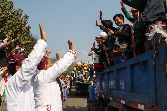 Kachin religious leaders wave to community Members and supporters of a Christian based anti-narcotic group in Wine Maw, northern Kachin State, Myanmar, 23 February 2016. Photo: Seng Mai/EPA
