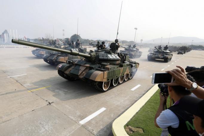 (File) Myanmar soldiers stand on the armor tanks during a parade commemorating the 77th Armed Forces Day in Naypyidaw Myanmar, 27 March 2022. Photo: EPA