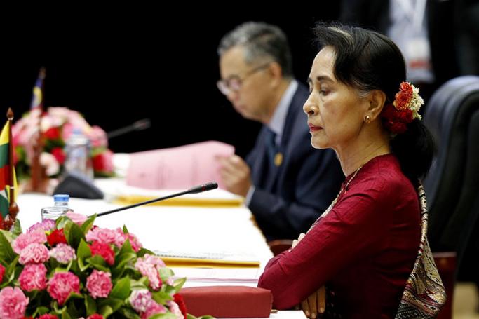 Myanmar State counsellor and Foreign Minister Aung San Suu Kyi (R) attends the meeting of South East Asia Nuclear Weapon Free Zone (SEANWFZ) during the Association of Southeast Asian Nations (ASEAN) meeting in Vientiane, Laos, 23 July 2016. Photo: Nyein Chan Naing/EPA
