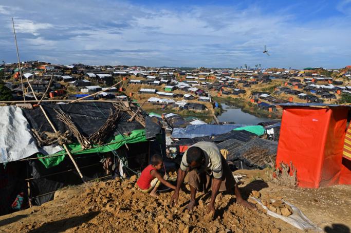 Rohingya Muslim refugees build makeshift shelters at Balukhali refugee camp near Ukhia on October 19, 2017. Photo: Tauseef Mustafa/AFP
