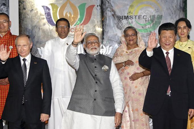 (front row L-R) Russian President Vladimir Putin, Indian Prime Minister Narendra Modi, Chinese President Xi Jinping, and (back row L-R) Bhutan's Prime Minister Tshering Tobgay, President of Sri Lanka Maithripala Sirisena, Prime Minister of Bangladesh Sheikh Hasina, Myanmar Foreign Minister and State Counselor Aung San Suu Kyi for group picture at BRICS-BIMSTEC summit 2016 on the sidelines of the 8th BRICS summit in Goa, India, 16 October 2016. Photo: Divyakant Solanki/EPA
