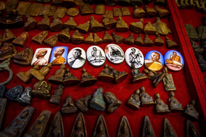 Budhhist amulets are offered for sale at a specialised market in Bangkok on June 2, 2020, as more sectors of the economy reopen following restrictions to halt the spread of the COVID-19 novel coronavirus.  Photo: AFP