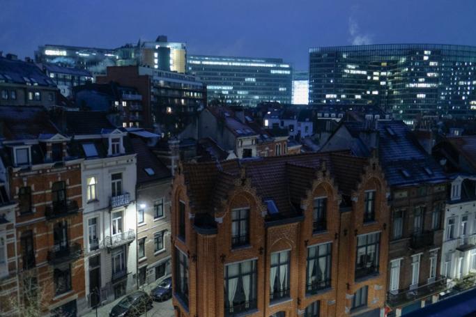 An early morning view of housing and European institution headquarters building in Brussels, Belgium. Photo: Olivier Hoslet/EPA
