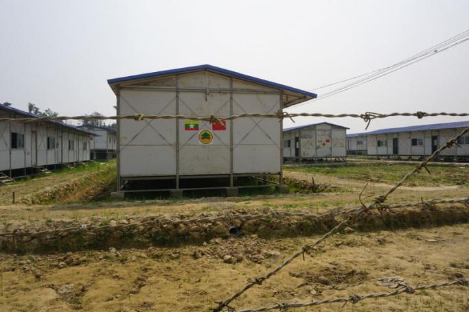 In this photograph taken on March 18, 2018, government's newly built processing camp for minority Rohingya Muslims pasted with Myanmar and Chinese flag stickers is seen in Taung Pyo Letwe located in Maungdaw in Rakhine state near Bangladesh border as Myanmar authorities prepare repatriation process. Photo: Joe Freeman/AFP
