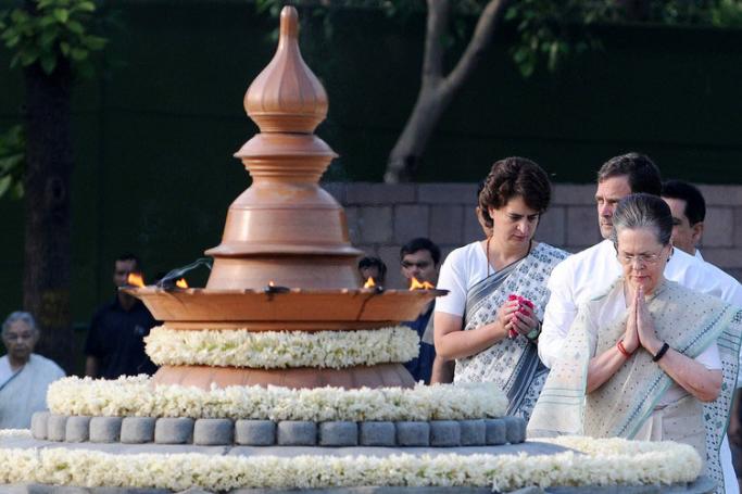 Senior Indian Congress Party leader Sonia Gandhi (front) with her son Rahul Gandhi (C) and daughter Priyanka Gandhi pay a tribute to her late husband, former Indian Prime Minister, Rajiv Gandhi at his memorial, Veer Bhumi, on the 28th anniversary of his death, New Delhi, India, 21 May 2019. Photo: EPA