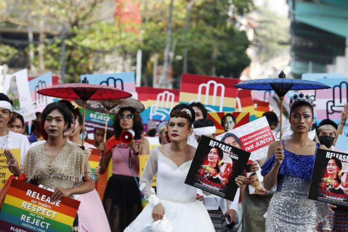 Members of the lesbian, gay, bisexual, transgender and queer (LGBTQ) community march during a protest against the military coup, in Yangon, Myanmar, 19 February 2021. Photo: EPA